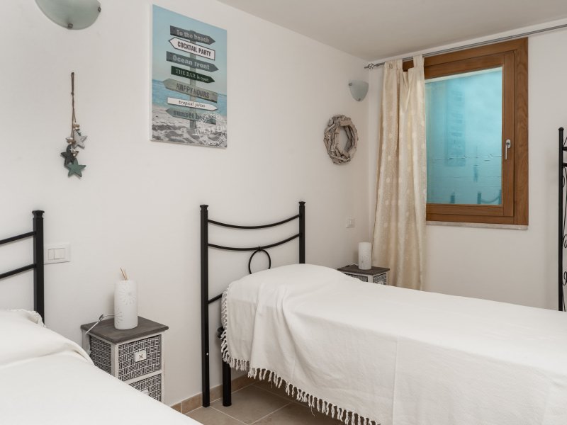 Schlafzimmer 5 mit zwei zusammenstellbaren Einzelbetten im UG Schlafzimmer 5 mit zwei zusammenstellbaren Einzelbetten im UG